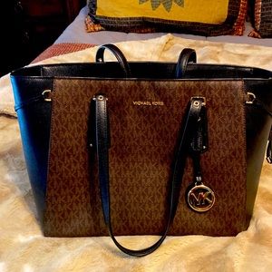 Michael Kors purse/ MK monogram with black trim